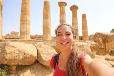 Portrait of smiling young woman