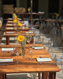 Flower vase on table in restaurant