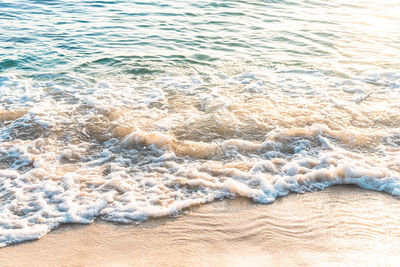 High angle view of surf on beach