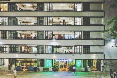 Building by street in city