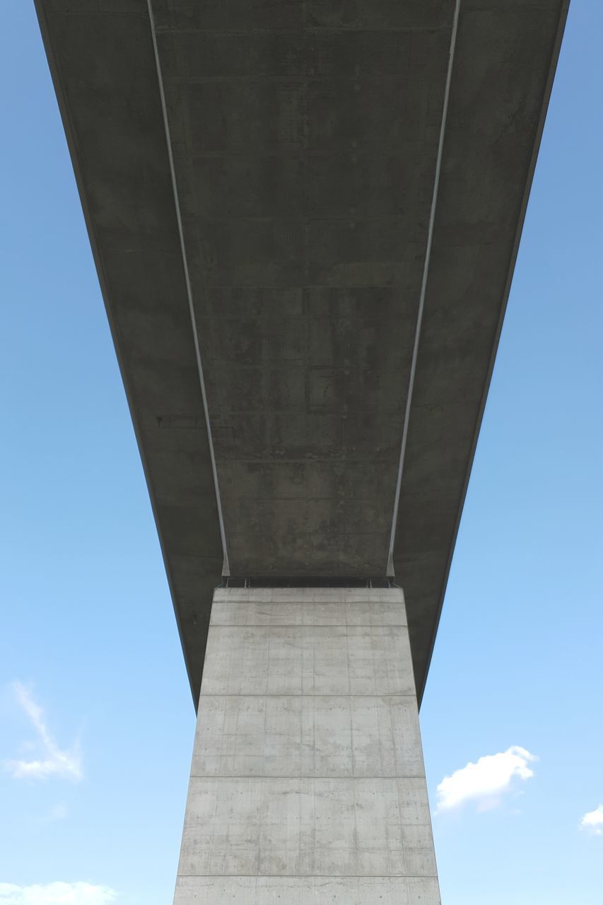 LOW ANGLE VIEW OF BRIDGE AGAINST CLOUDY SKY