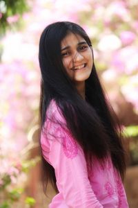 Portrait of smiling young woman