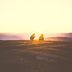 Scenic view of landscape at sunset