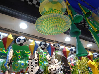 Low angle view of illuminated lanterns hanging at market