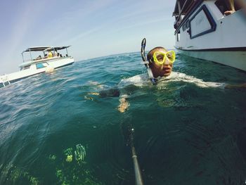 Man swimming in sea