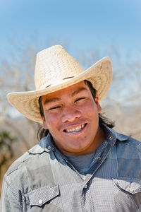 Portrait of smiling man wearing hat