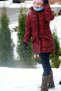 Full length of child standing on snow