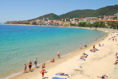 High angle view of people enjoying at beach