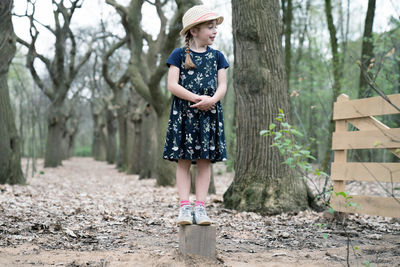 Full length of girl in forest