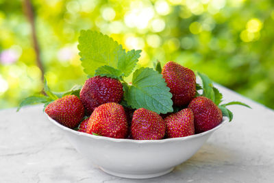 Close-up of strawberries in bowl on table