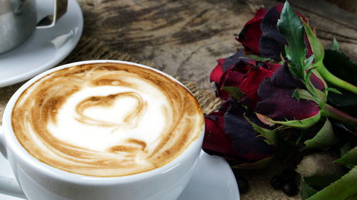 Close-up of cappuccino on table