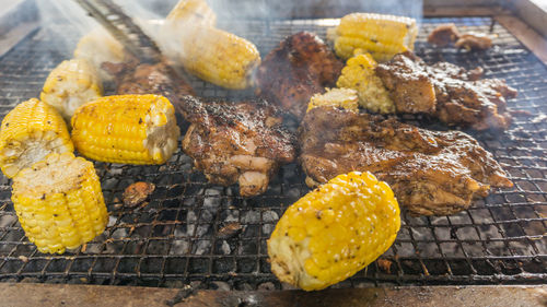 Close-up of meat on barbecue grill