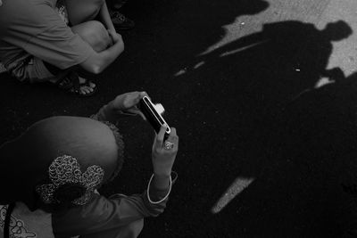 Woman standing in the dark