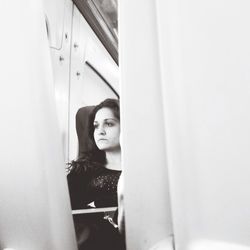 Portrait of a young woman looking away