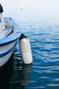 Boats in calm lake