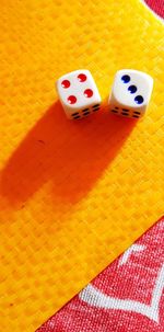 High angle view of yellow and orange on table