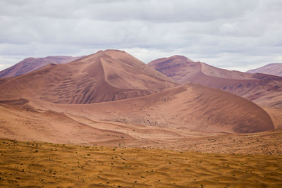 Scenic view of desert against sky