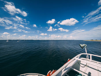 Scenic view of sea against blue sky