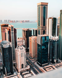 Modern buildings in city against sky