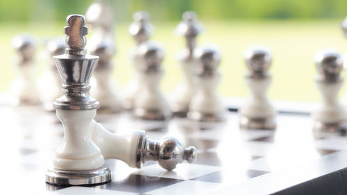 Close-up of chess pieces on board