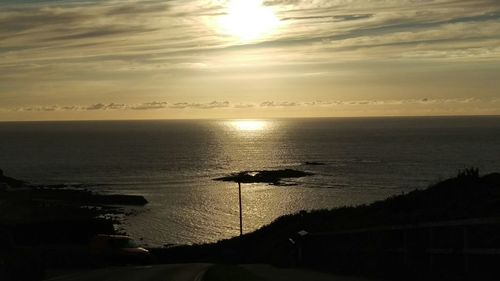 Scenic view of sunset over sea