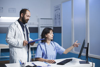 Portrait of doctor working in office