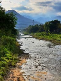 Scenic view of river against sky