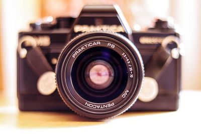 Close-up of camera on table