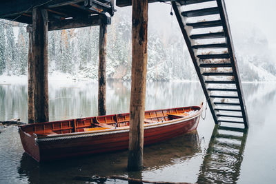 Boat moored in lake