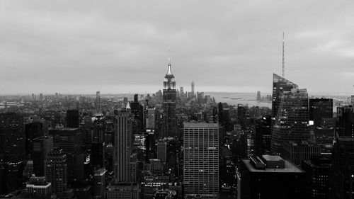 Buildings in city against sky