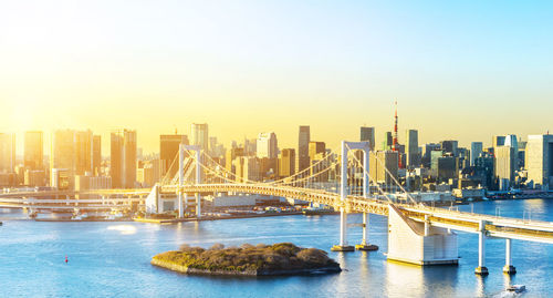 Suspension bridge over river in city