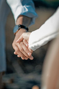 Close-up of hand holding hands