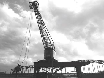 Low angle view of building against cloudy sky