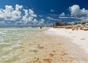 Scenic view of beach against sky