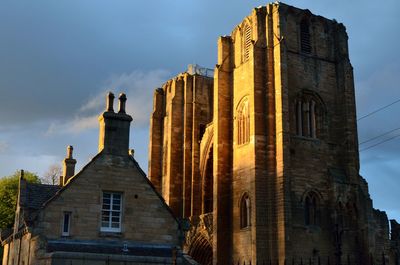 Low angle view of old building against sky