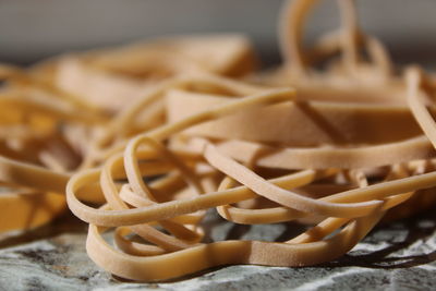 Close-up of rubber bands on table 