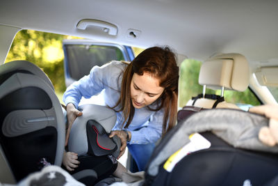 Woman sitting in car