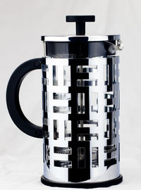 Telephone booth on pole against sky