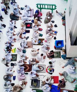 High angle view of multi colored shoes on floor