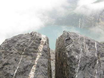 Close-up of rocks against sky