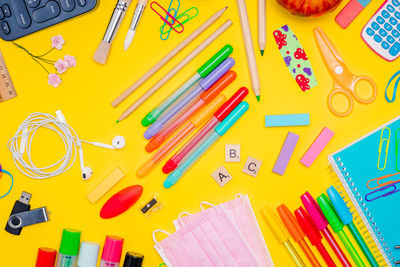 High angle view of various objects on table