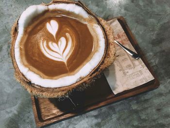 High angle view of cappuccino on table