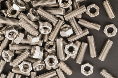 High angle view of nuts and bolts on table