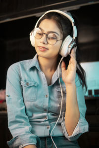 Young woman using mobile phone