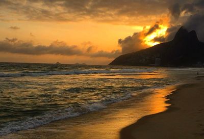 Scenic view of sea at sunset