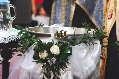 Close-up of white roses on table