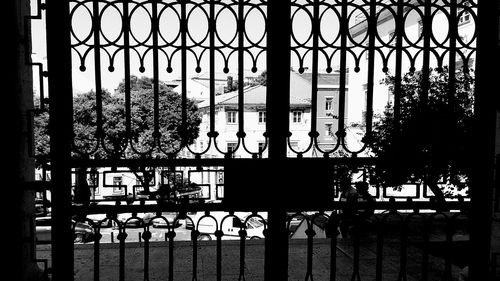 View of metal grate through window