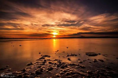 Scenic view of sunset over sea