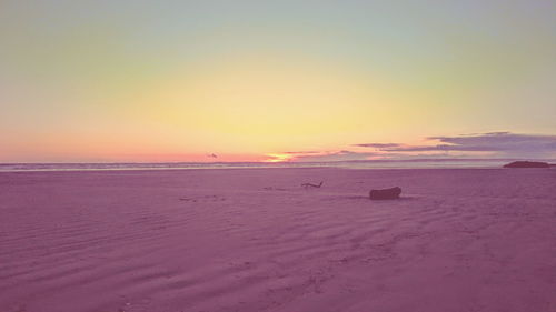 Scenic view of sea at sunset