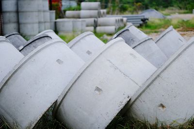 High angle view of old stack on field